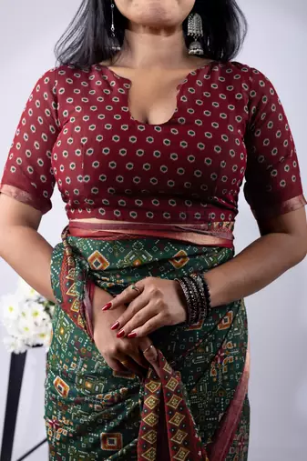 women's green patola viscose saree with unstitched piece