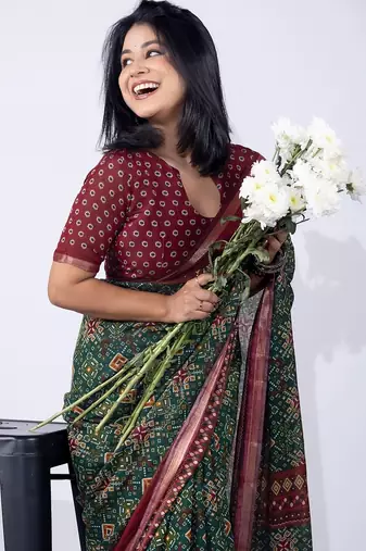 women's green patola viscose saree with unstitched piece