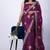 Women's magenta embellished soft silk blend saree with unstitched piece