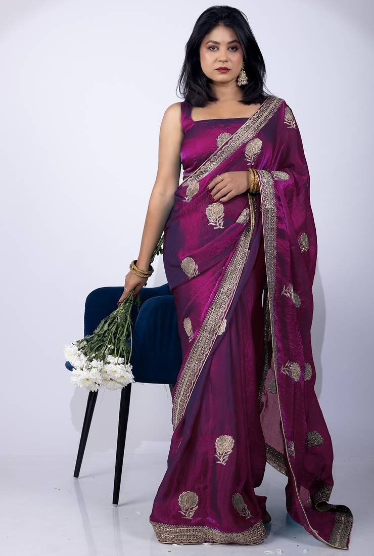 Women's magenta embellished soft silk blend saree with unstitched piece