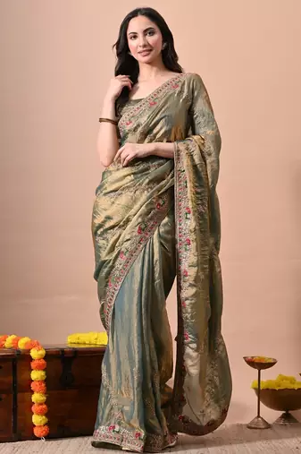 Women's green embellished soft silk blend saree with unstitched piece