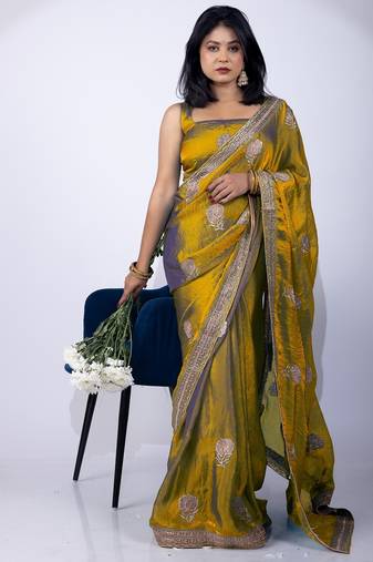 Women's mustard embellished soft silk blend saree with unstitched piece
