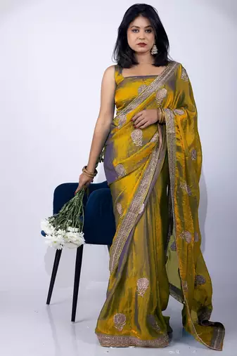 Women's mustard embellished soft silk blend saree with unstitched piece