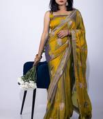 Women's mustard embellished soft silk blend saree with unstitched piece