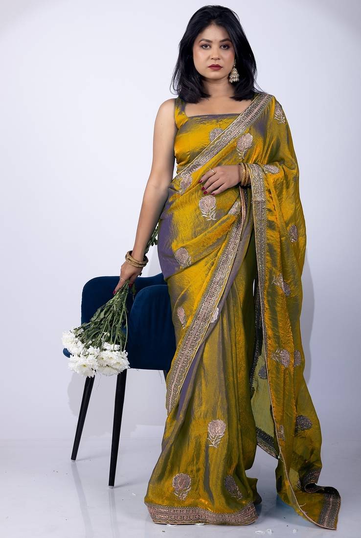 Women's mustard embellished soft silk blend saree with unstitched piece