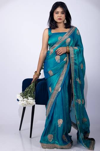 Women's turquoise embellished soft silk blend saree with unstitched piece