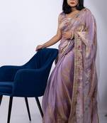 Women's lavender embellished soft silk blend saree with unstitched piece