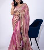 Women's pink embellished soft silk blend saree with unstitched piece