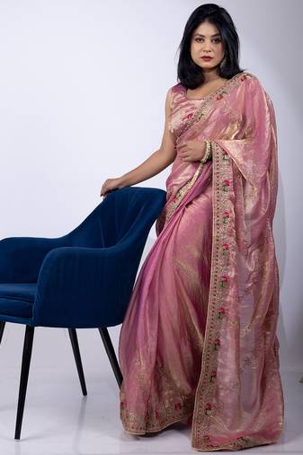 Women's pink embellished soft silk blend saree with unstitched piece