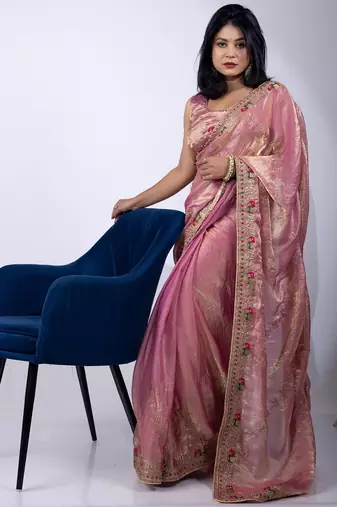 Women's pink embellished soft silk blend saree with unstitched piece