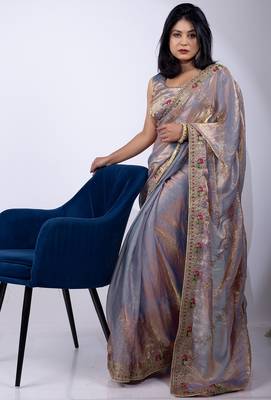 Women's violet embellished soft silk blend saree with unstitched piece 1