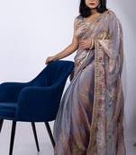 Women's violet embellished soft silk blend saree with unstitched piece
