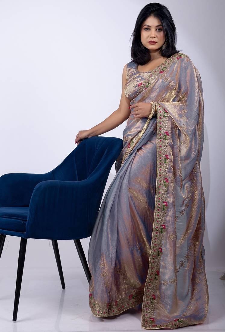 Women's violet embellished soft silk blend saree with unstitched piece