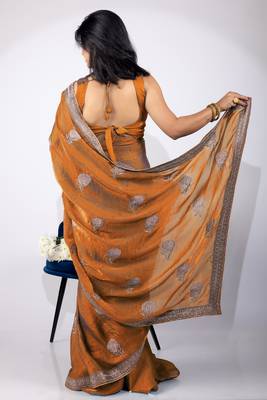 Women's orange embellished soft silk blend saree with unstitched piece 3