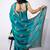 Women's turquoise embellished soft silk blend saree with unstitched piece