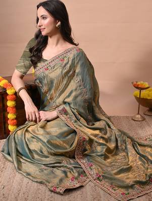 Women's green embellished soft silk blend saree with unstitched piece 2