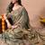 Women's green embellished soft silk blend saree with unstitched piece