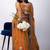 Women's orange embellished soft silk blend saree with unstitched piece