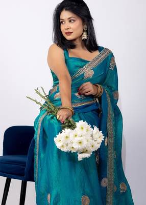 Women's turquoise embellished soft silk blend saree with unstitched piece 3