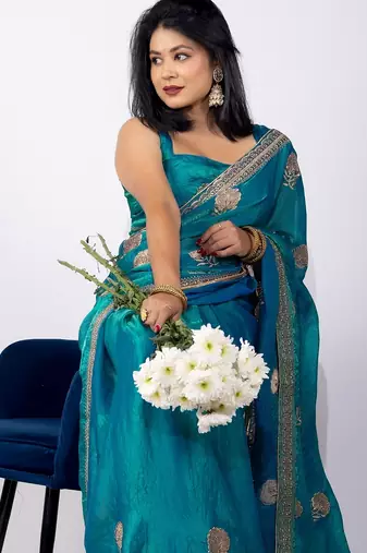 Women's turquoise embellished soft silk blend saree with unstitched piece