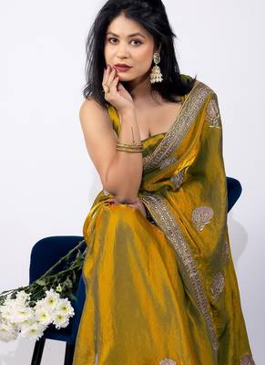 Women's mustard embellished soft silk blend saree with unstitched piece 3