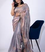 Women's blue embellished soft silk blend saree with unstitched piece