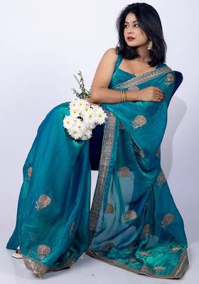 Women's turquoise embellished soft silk blend saree with unstitched piece 4