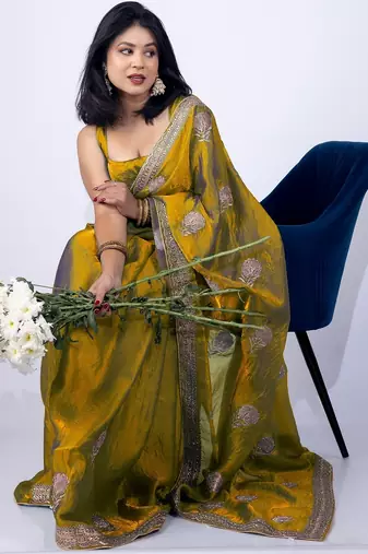Women's mustard embellished soft silk blend saree with unstitched piece