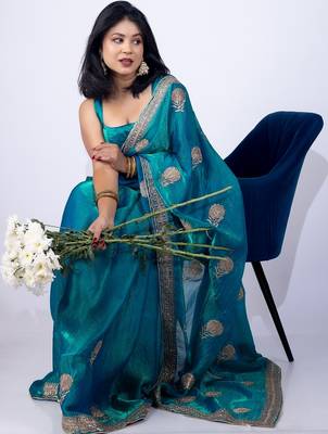 Women's turquoise embellished soft silk blend saree with unstitched piece 5