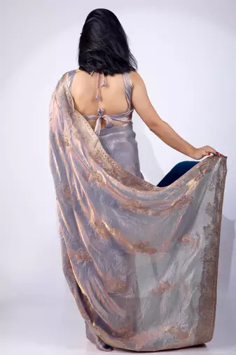 Women's blue embellished soft silk blend saree with unstitched piece