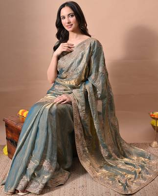 Women's turquoise embellished soft silk blend saree with unstitched piece 2