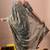 Women's turquoise embellished soft silk blend saree with unstitched piece