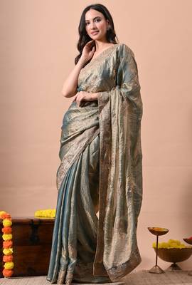 Women's turquoise embellished soft silk blend saree with unstitched piece 4