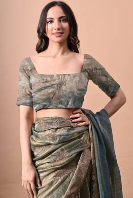Women's turquoise embellished soft silk blend saree with unstitched piece 5
