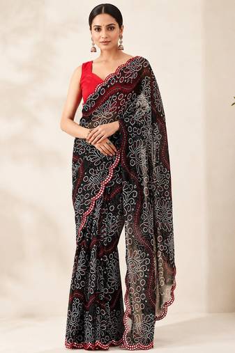 Black bandhani printed saree with mirror work & cutwork border