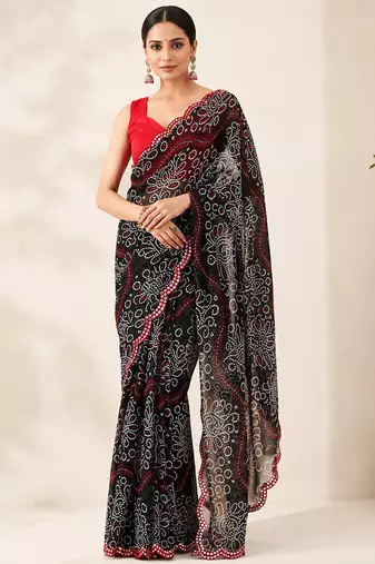 Black bandhani printed saree with mirror work & cutwork border