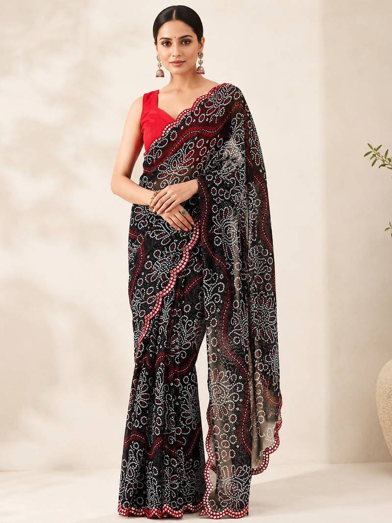 Black bandhani printed saree with mirror work & cutwork border