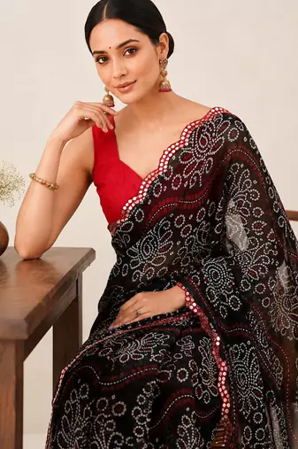 Black bandhani printed saree with mirror work & cutwork border