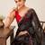Black bandhani printed saree with mirror work & cutwork border