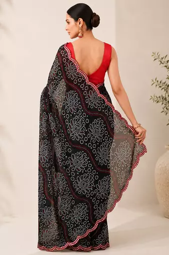 Black bandhani printed saree with mirror work & cutwork border