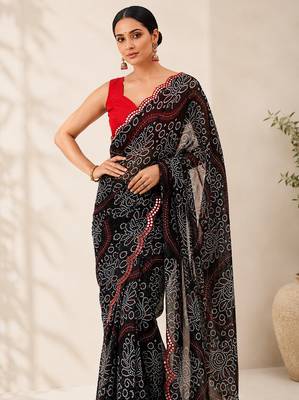 Black bandhani printed saree with mirror work & cutwork border 4