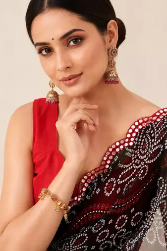 Black bandhani printed saree with mirror work & cutwork border
