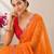 Orange bandhani printed saree with mirror work & cutwork border