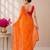 Orange bandhani printed saree with mirror work & cutwork border