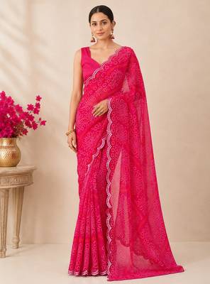 Pink bandhani printed saree with mirror work & cutwork border 4