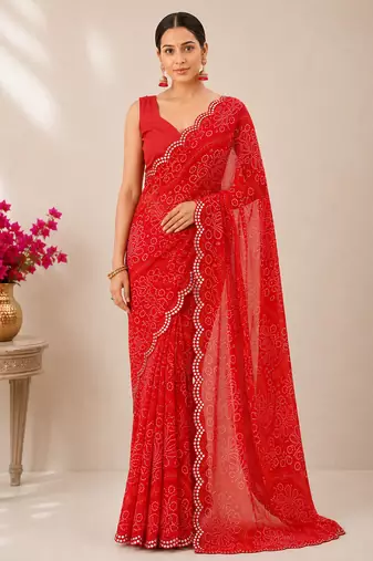 Red bandhani printed saree with mirror work & cutwork border