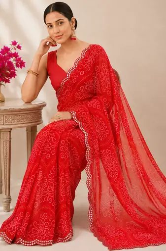 Red bandhani printed saree with mirror work & cutwork border