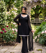 Women black georgette bell sleeve kurta with flared sharara & dupatta set