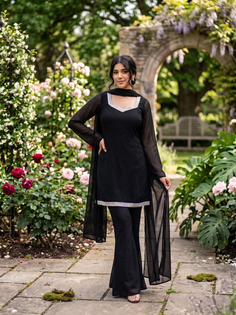 Women black georgette bell sleeve kurta with flared sharara & dupatta set