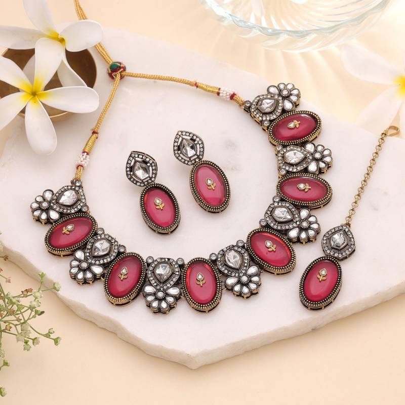 Maroon color traditional kundan jewellery set
